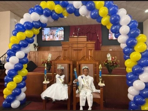 MPCA pageant king and queen on stage