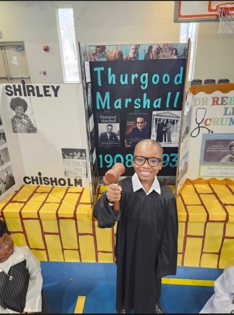 Student presenting Thurgood Marshall Black History project