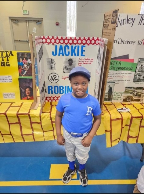 Student presenting Jackie Robinson Black History project